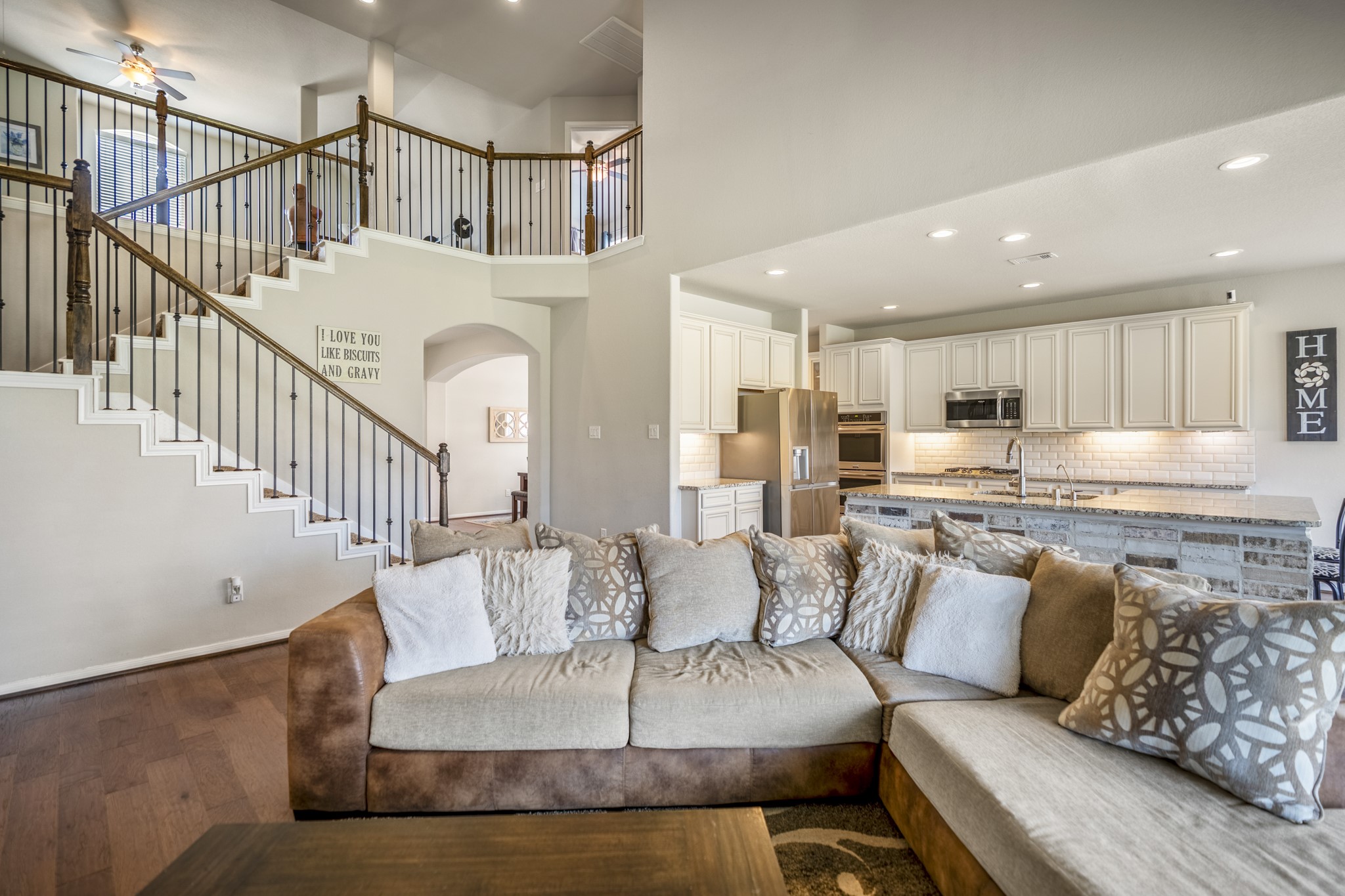 23006 Mulberry Tree Lane Spring, TX 77389 - Photo 13 of 50 a living room with furniture and kitchen view