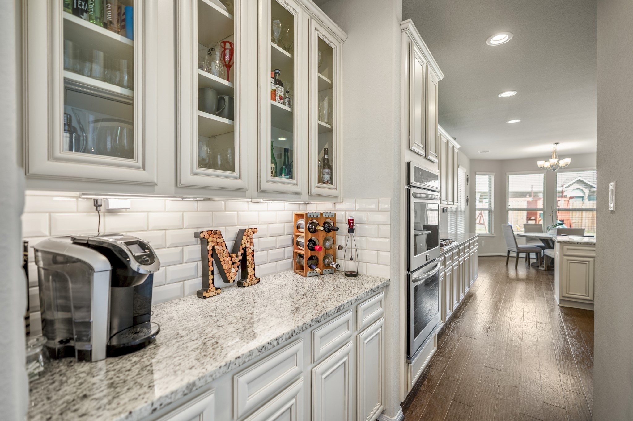 23006 Mulberry Tree Lane Spring, TX 77389 - Photo 17 of 50 a kitchen with stainless steel appliances granite countertop a refrigerator and a sink