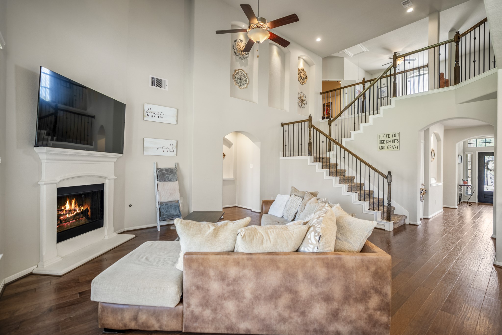 23006 Mulberry Tree Lane Spring, TX 77389 - Photo 20 of 50 a living room with furniture fireplace and flat screen tv