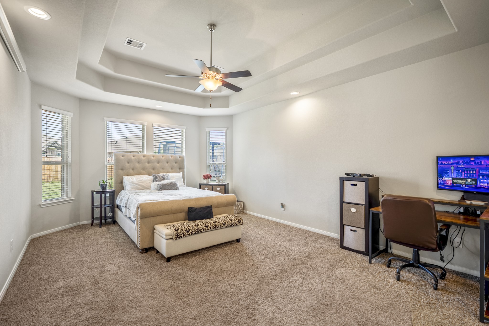 23006 Mulberry Tree Lane Spring, TX 77389 - Photo 21 of 50 a bedroom with a bed gym equipment and a desk