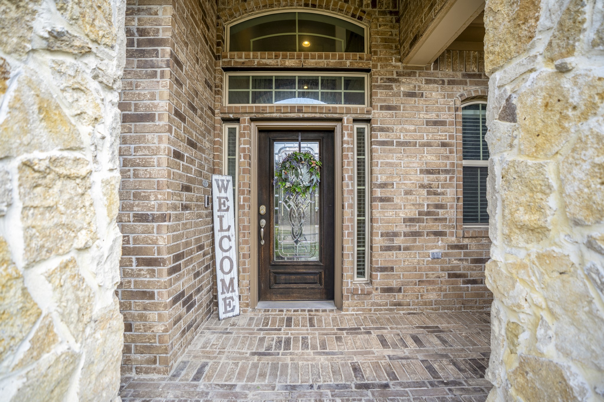 23006 Mulberry Tree Lane Spring, TX 77389 - Photo 4 of 50 a front view of a building with a door and a shower