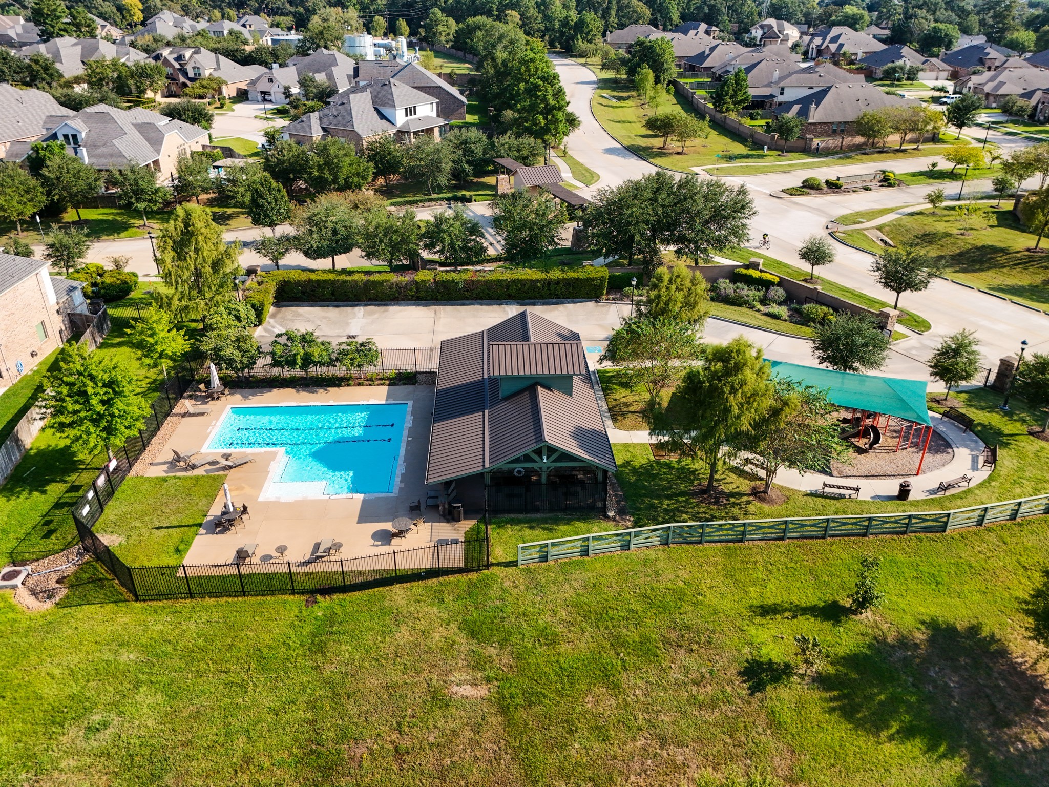 23006 Mulberry Tree Lane Spring, TX 77389 - Photo 48 of 50 an aerial view of a house with a garden and lake view