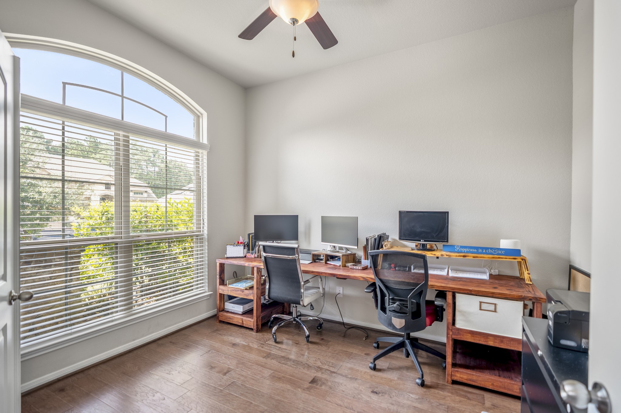 23006 Mulberry Tree Lane Spring, TX 77389 - Photo 7 of 50 a view of a workspace with furniture and a window