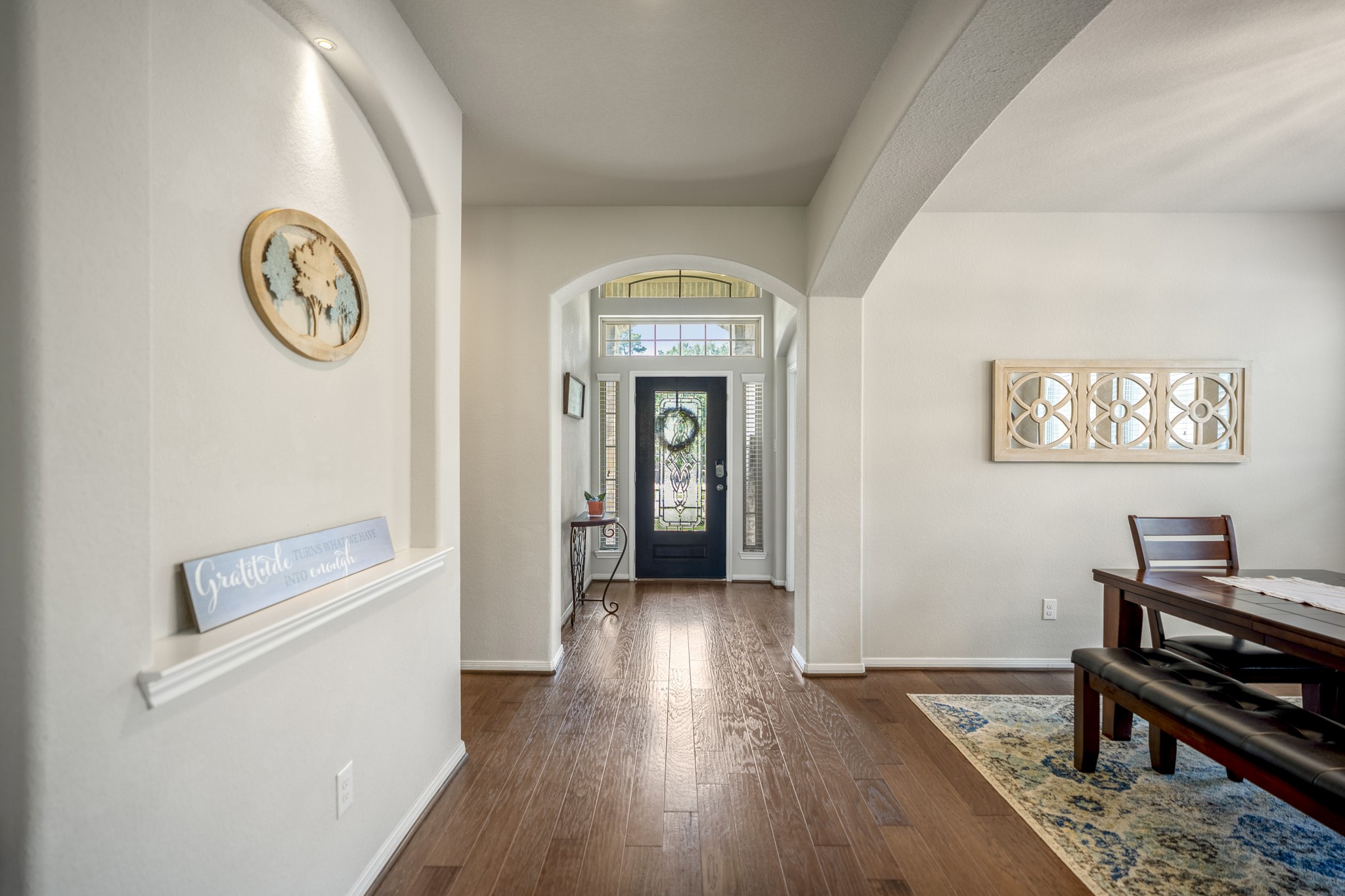 23006 Mulberry Tree Lane Spring, TX 77389 - Photo 8 of 50 a view of a hallway with wooden floor