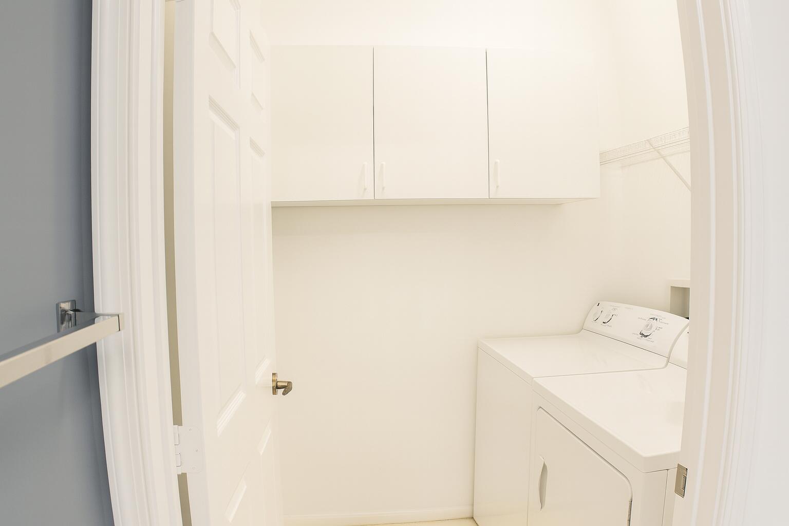6387 Long Key Lane Boynton Beach, FL 33472 - Photo 28 of 49 a utility room with dryer and washer
