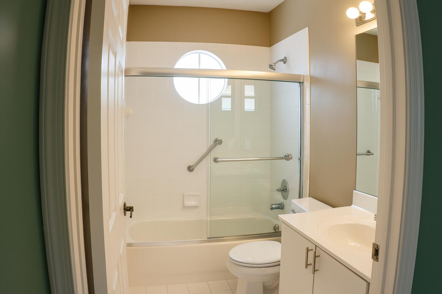 6387 Long Key Lane Boynton Beach, FL 33472 - Photo 37 of 49 a bathroom with a shower a sink and toilet
