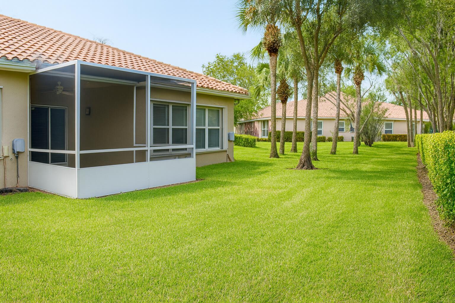 6387 Long Key Lane Boynton Beach, FL 33472 - Photo 38 of 49 a view of a house with a backyard