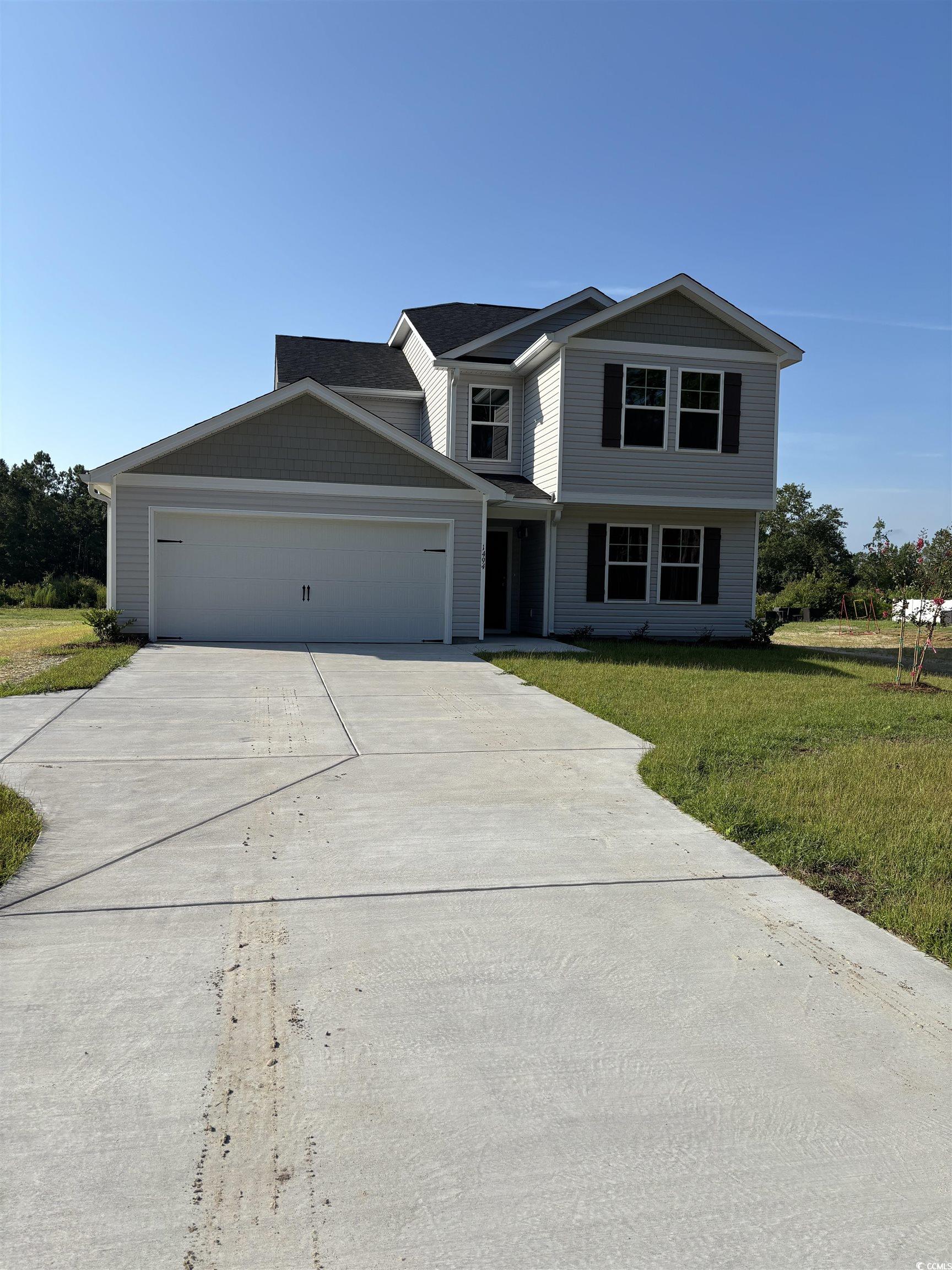 1494 Hardwick Road Conway, SC 29526 - Photo 1 of 33 View of front of home with driveway, an attached g