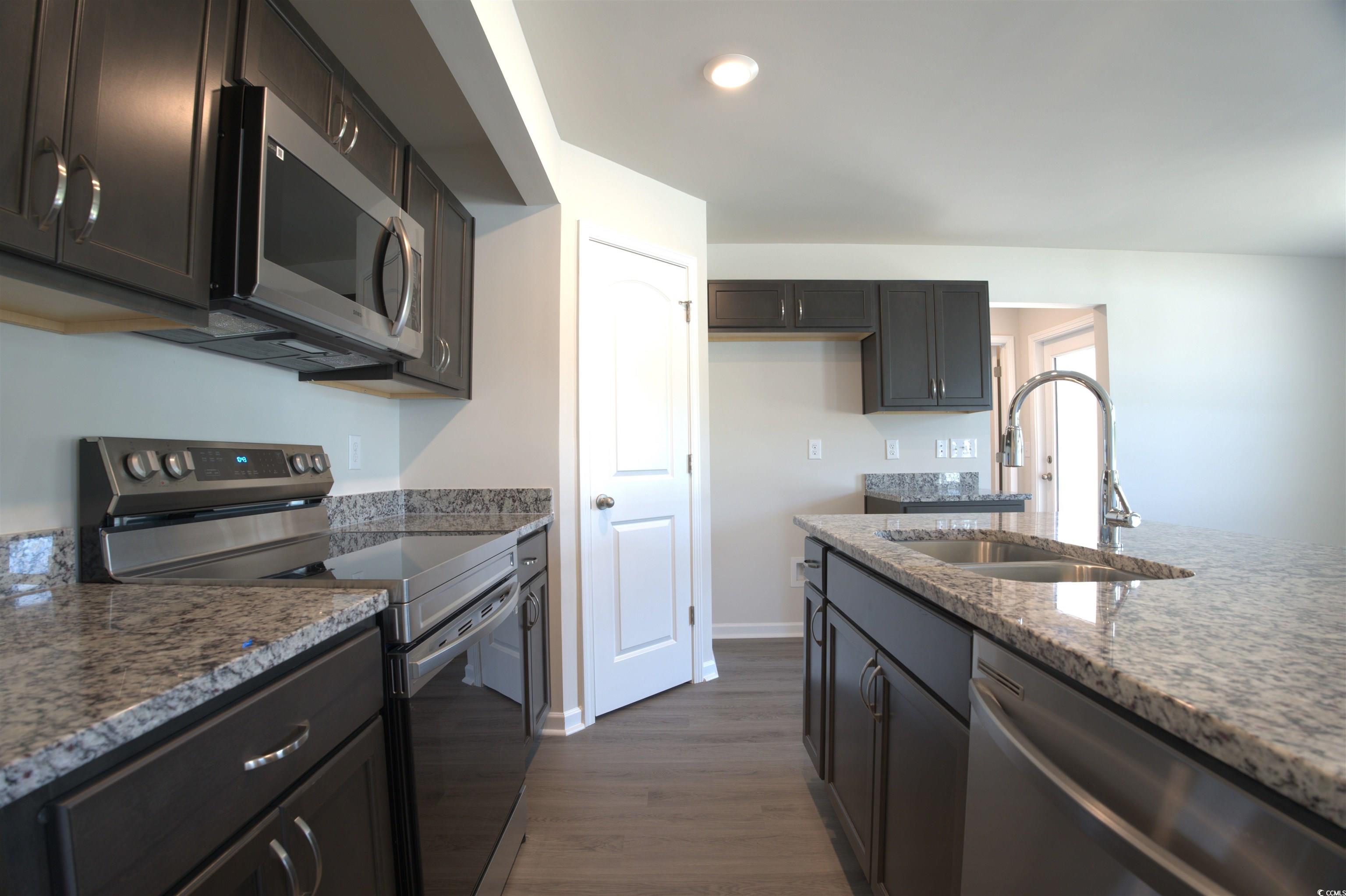 1494 Hardwick Road Conway, SC 29526 - Photo 10 of 33 Kitchen with stainless steel appliances, dark wood