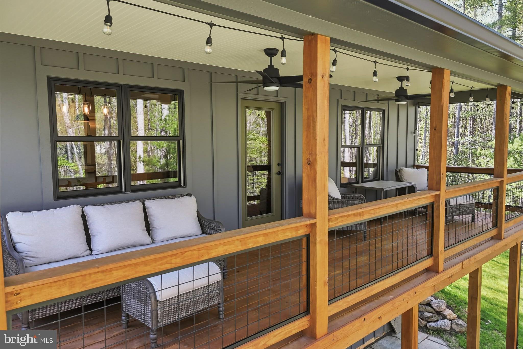 677 Weaver Hollow Road Banco, VA 22711 - Photo 4 of 34 Balcony for lounging, complete with ceiling fans