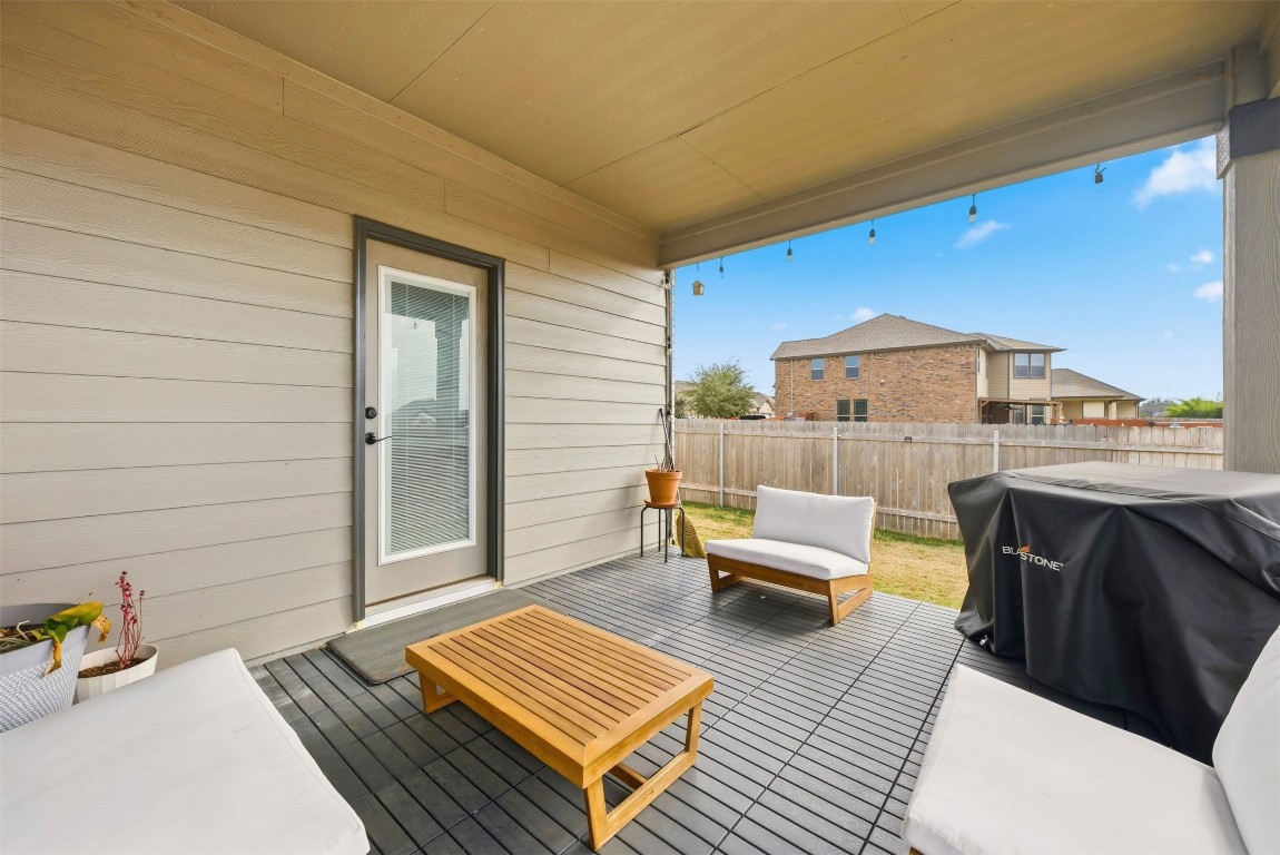1506 Dragonfly Loop Bastrop, TX 78602 - Photo 30 of 37 a balcony with furniture and a rug