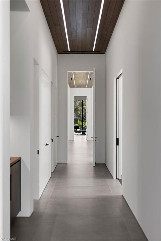 107 Myrtle Road Naples, FL 34108 - Photo 45 of 49 Hall with a high ceiling and wooden ceiling