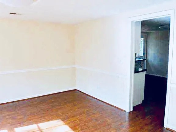6741 Moon Road Columbus, GA 31909 - Photo 12 of 16 an empty room with wooden floor and closet