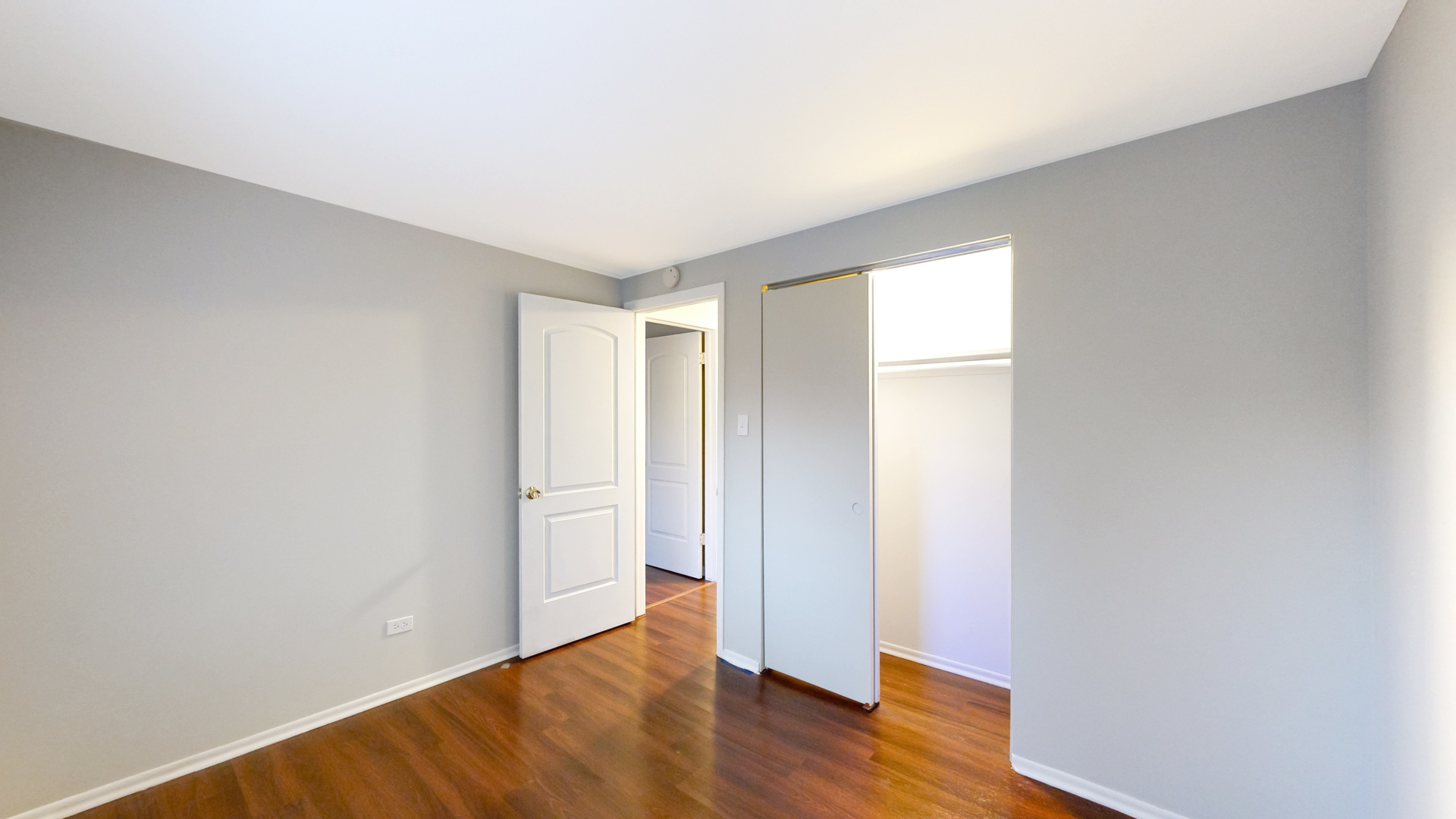 611 Andover Street Chicago Heights, IL 60411 - Photo 15 of 30 a view of an empty room with wooden floor