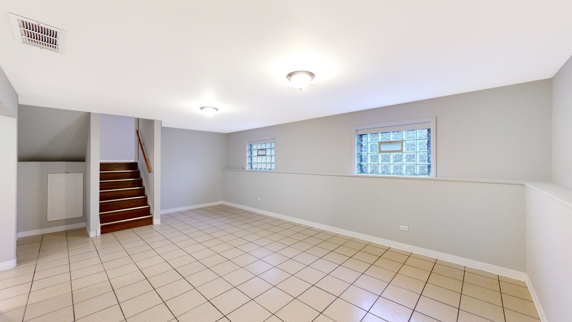 611 Andover Street Chicago Heights, IL 60411 - Photo 19 of 30 a view of an empty room with stairs