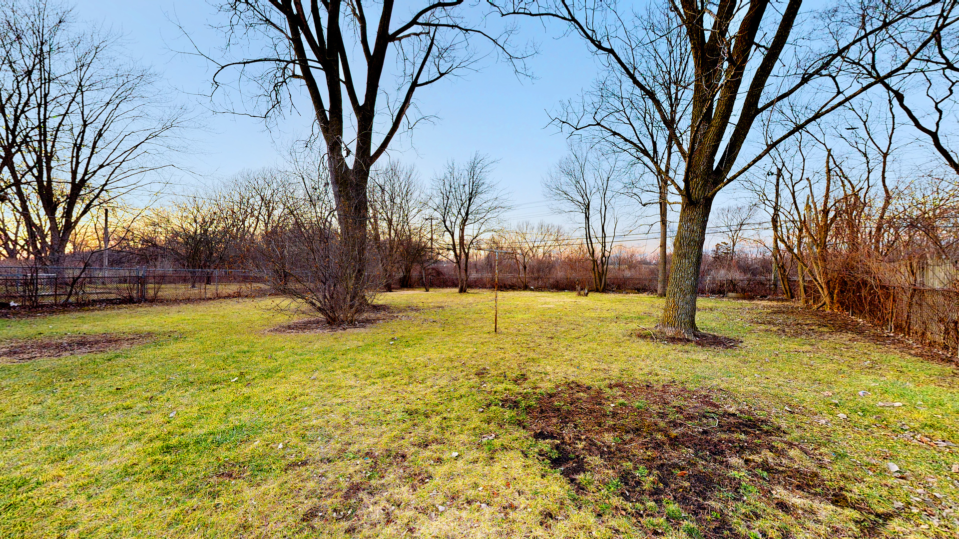 611 Andover Street Chicago Heights, IL 60411 - Photo 24 of 30 a view of yard with wooden fence