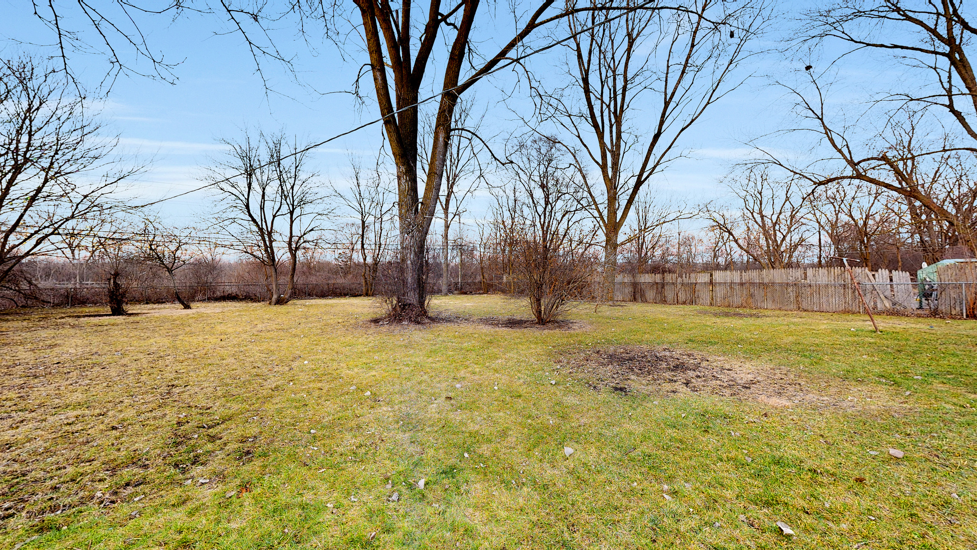 611 Andover Street Chicago Heights, IL 60411 - Photo 25 of 30 a view of yard covered with snow in front of house