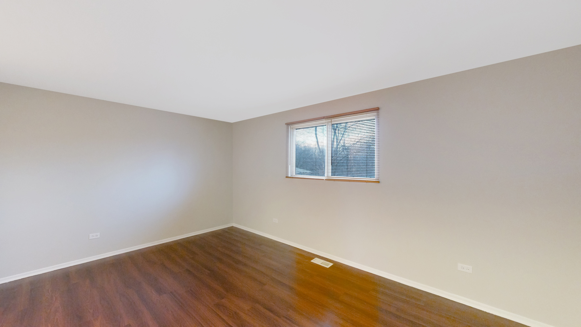611 Andover Street Chicago Heights, IL 60411 - Photo 10 of 30 a view of an empty room with wooden floor