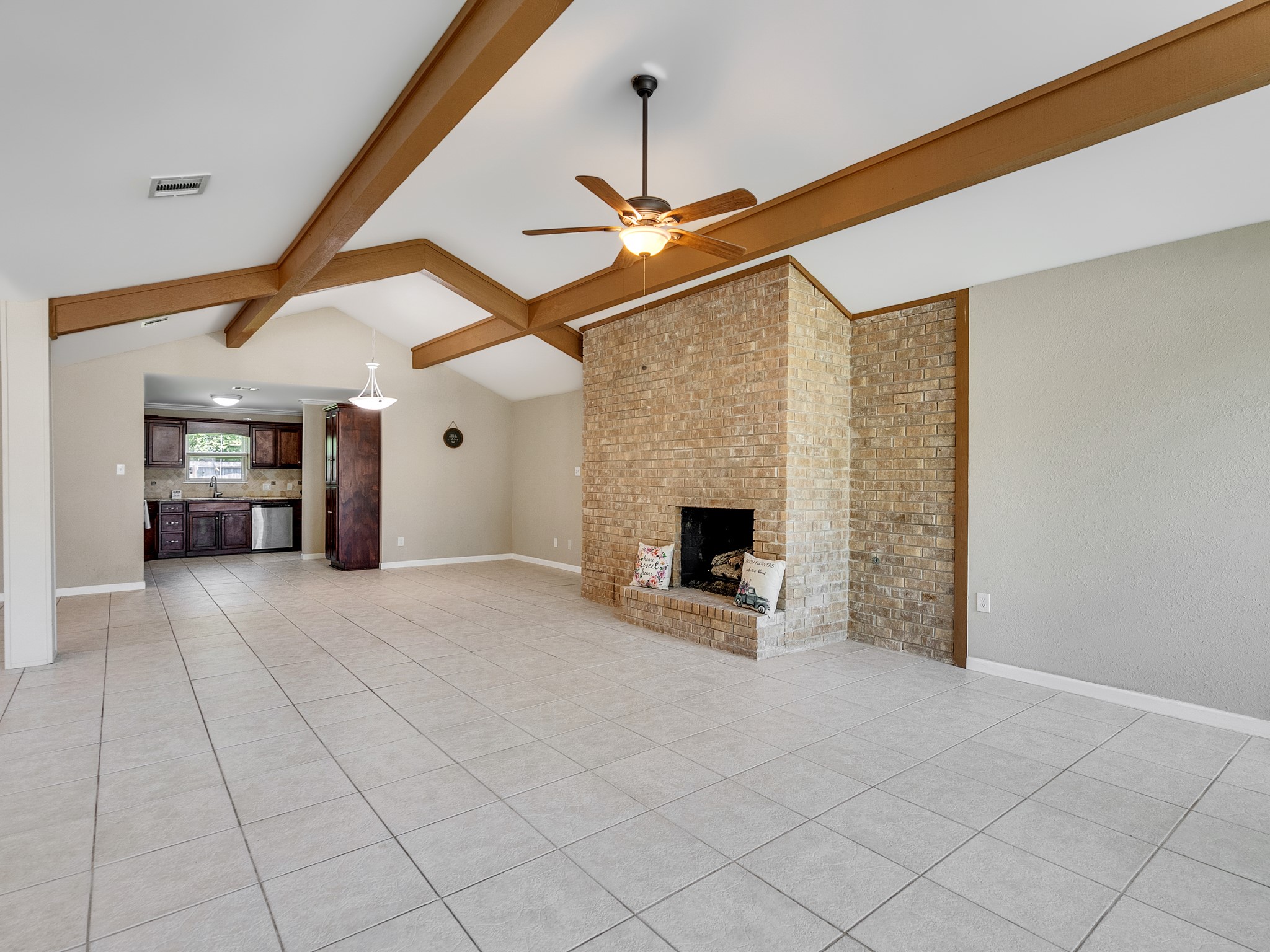 603 Casper Court Spring, TX 77373 - Photo 5 of 31 View when you walk in the front door. Kitchen to the back. HUGE OPEN Family room with lots of light