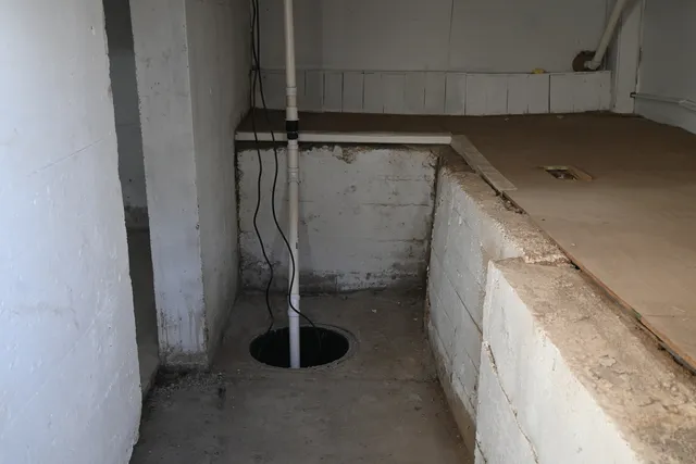 a view of walk in closet with clothes