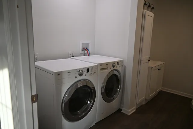 a utility room with dryer and washer