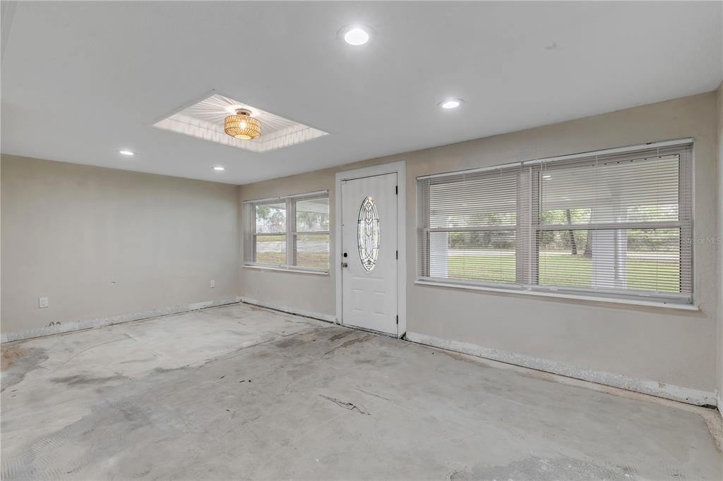 103 Flagler Avenue Edgewater, FL 32132 - Photo 12 of 53 an empty room with a window