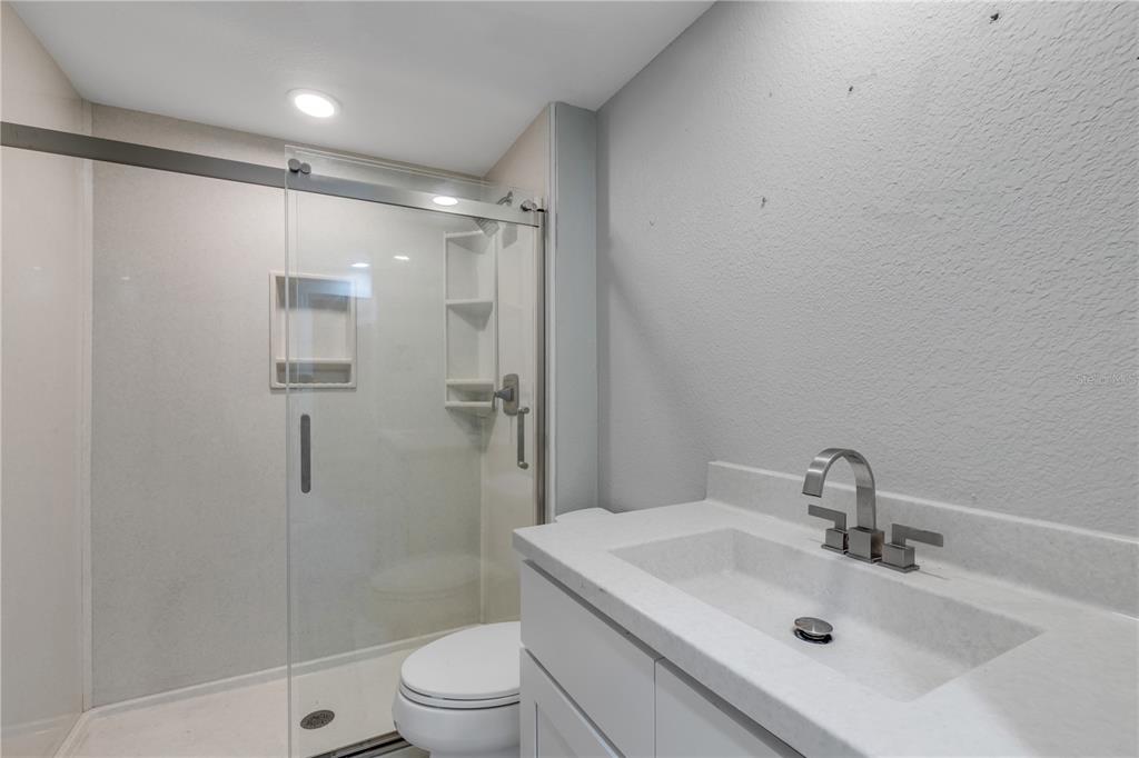 103 Flagler Avenue Edgewater, FL 32132 - Photo 16 of 53 a bathroom with a sink toilet and shower