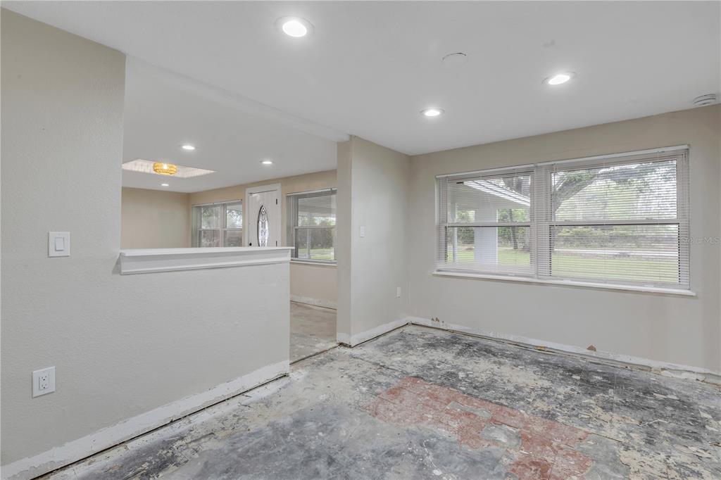 103 Flagler Avenue Edgewater, FL 32132 - Photo 24 of 53 a view of an empty room with a window