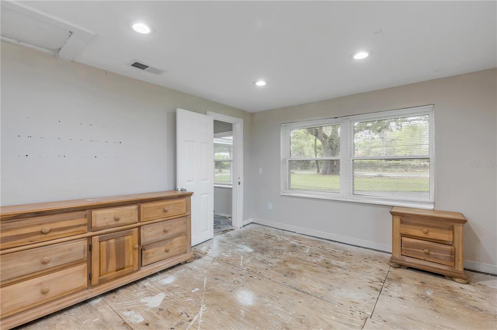 103 Flagler Avenue Edgewater, FL 32132 - Photo 32 of 53 a room with furniture and window