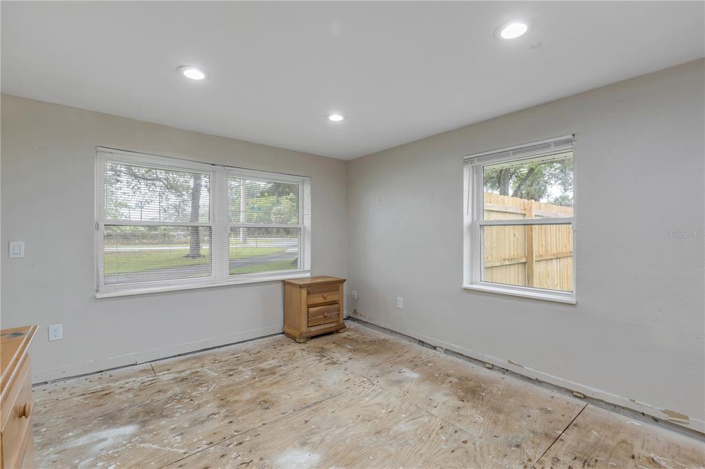 103 Flagler Avenue Edgewater, FL 32132 - Photo 33 of 53 a view of an empty room with a window