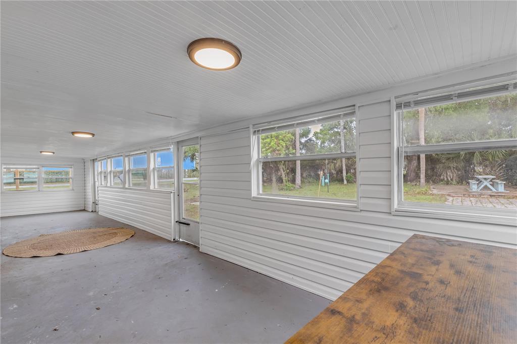 103 Flagler Avenue Edgewater, FL 32132 - Photo 35 of 53 an empty room with windows