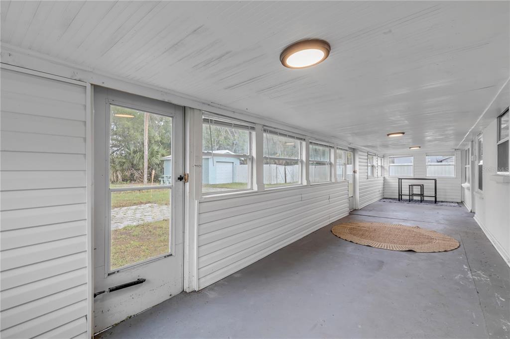 103 Flagler Avenue Edgewater, FL 32132 - Photo 36 of 53 a view of an empty room with a window