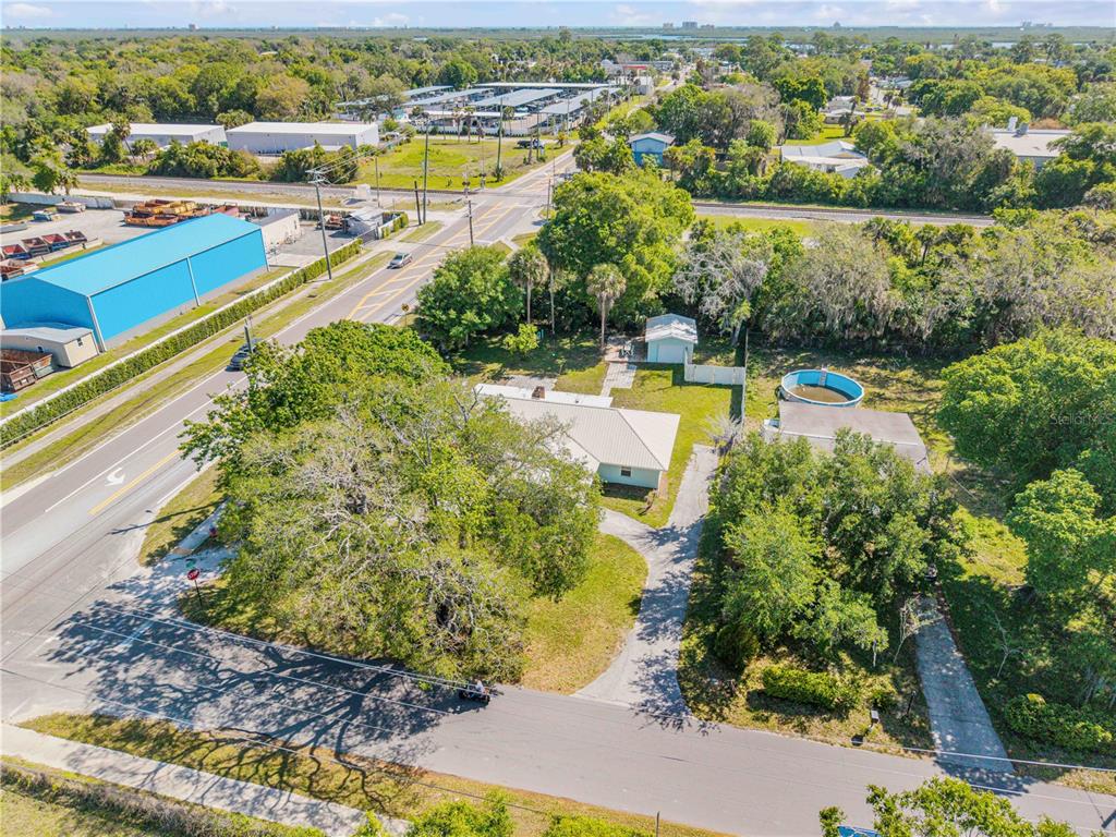 103 Flagler Avenue Edgewater, FL 32132 - Photo 42 of 53 an aerial view of residential houses with outdoor space and swimming pool