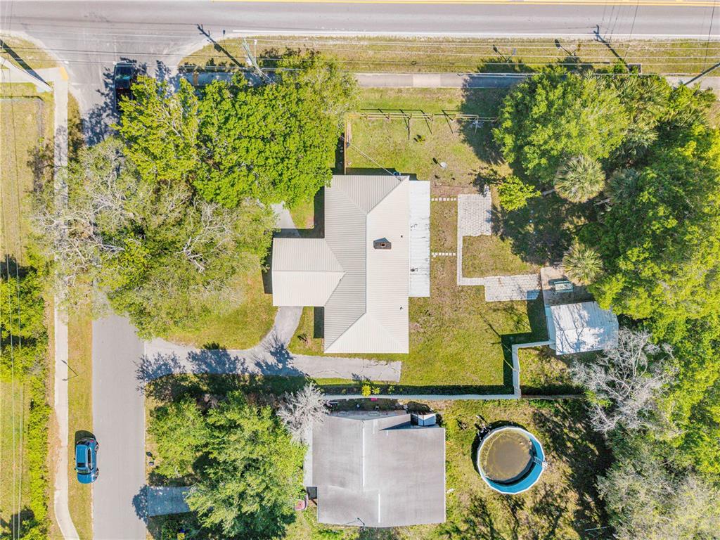 103 Flagler Avenue Edgewater, FL 32132 - Photo 43 of 53 an aerial view of residential house with outdoor space and swimming pool