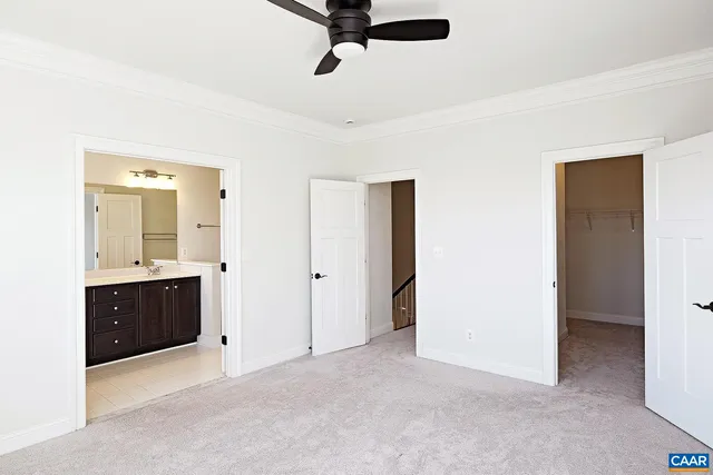 a view of a bathroom with a sink and mirror