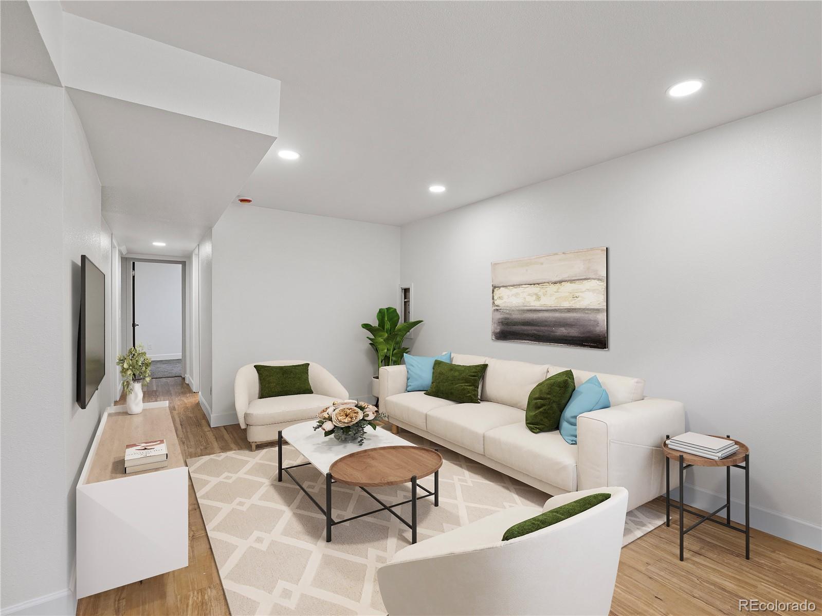 7889 North Pecos Street Denver, CO 80221 - Photo 33 of 42 a living room with furniture and wooden floor