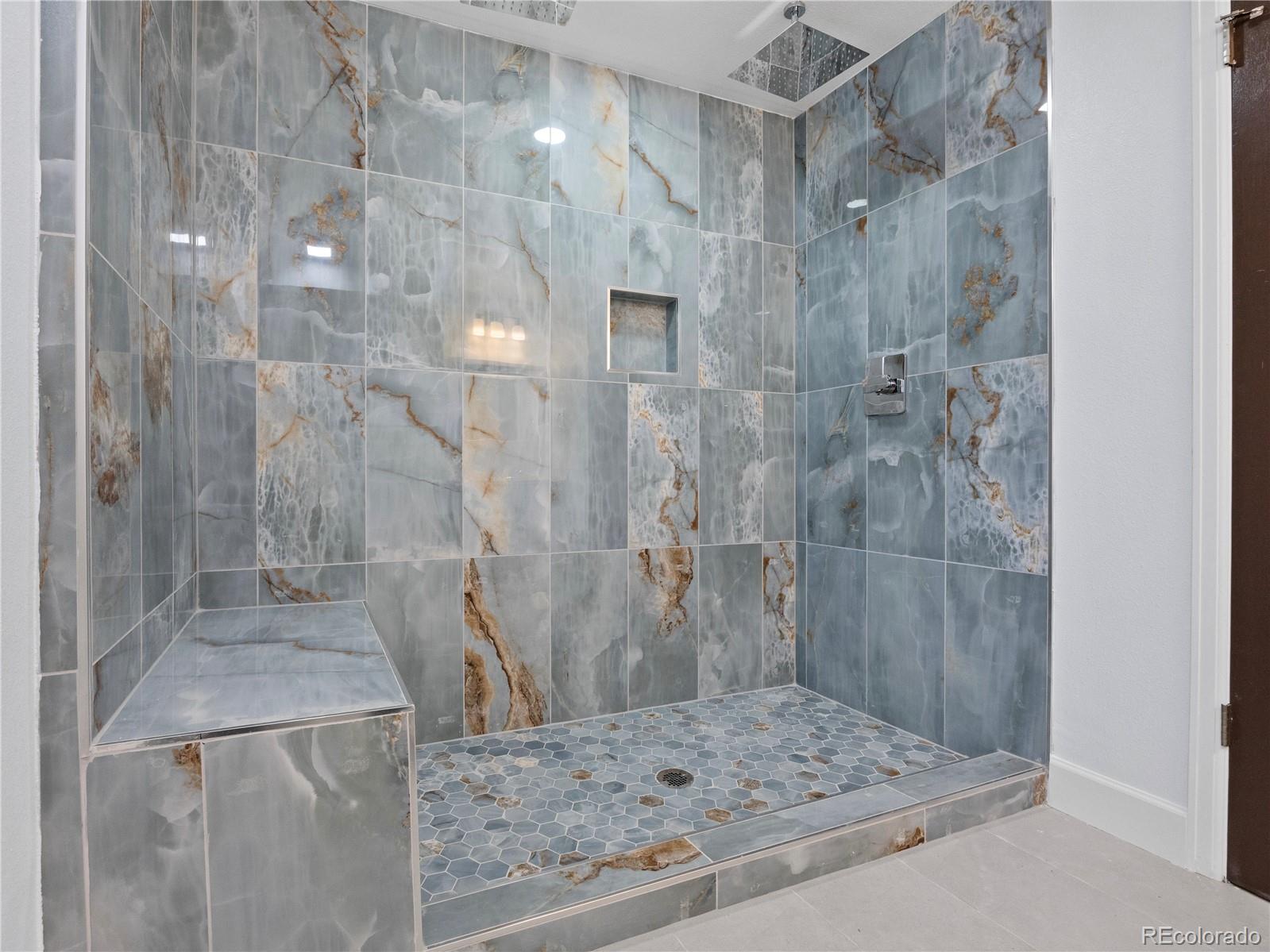 7889 North Pecos Street Denver, CO 80221 - Photo 39 of 42 a bathroom with a shower