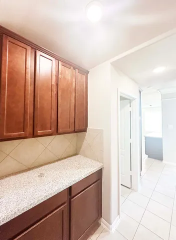 a room with a large window and a shower