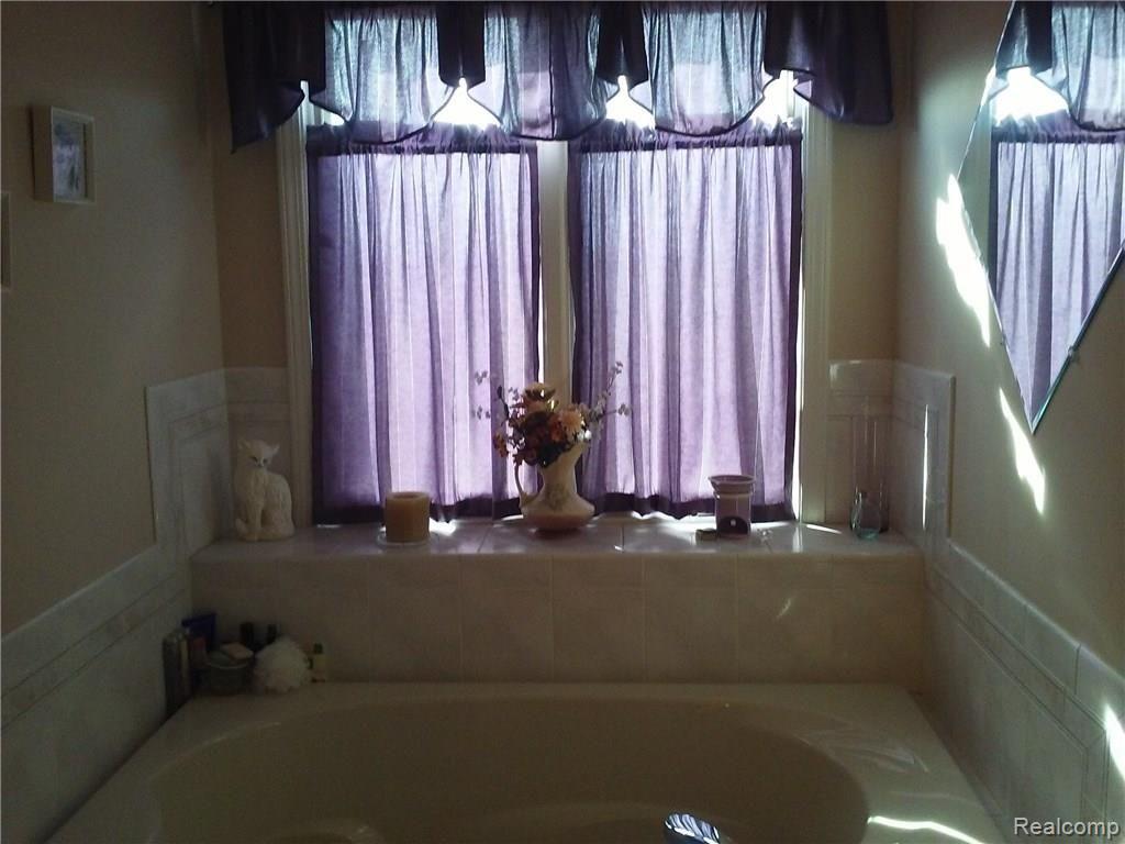 4660 Capac Road Capac, MI 48014 - Photo 25 of 65 This is another view of the master bathroom.