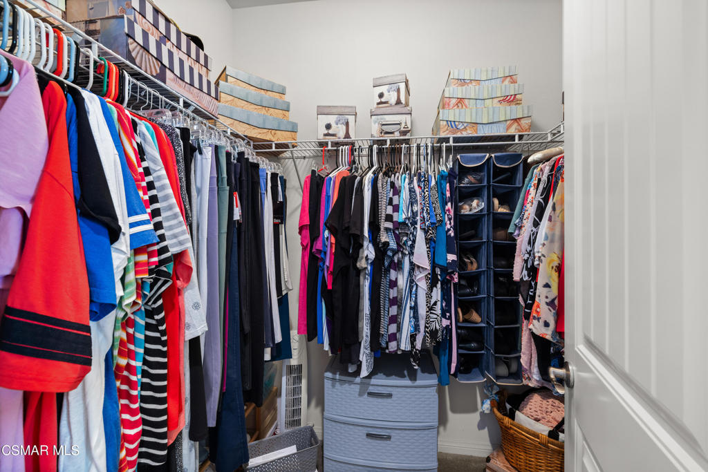 417 White Bark Lane Simi Valley, CA 93065 - Photo 18 of 30 a view of walk in closet with clothes and shoes