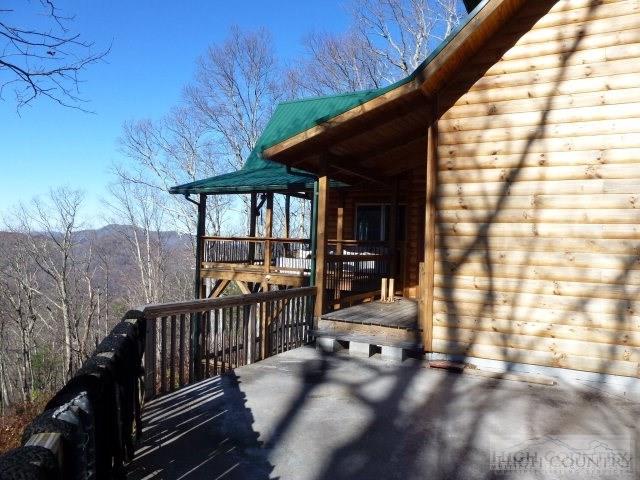 775 Miners Ridge Trail Banner Elk, NC 28604 - Photo 39 of 41 a view of backyard with deck and outdoor seating