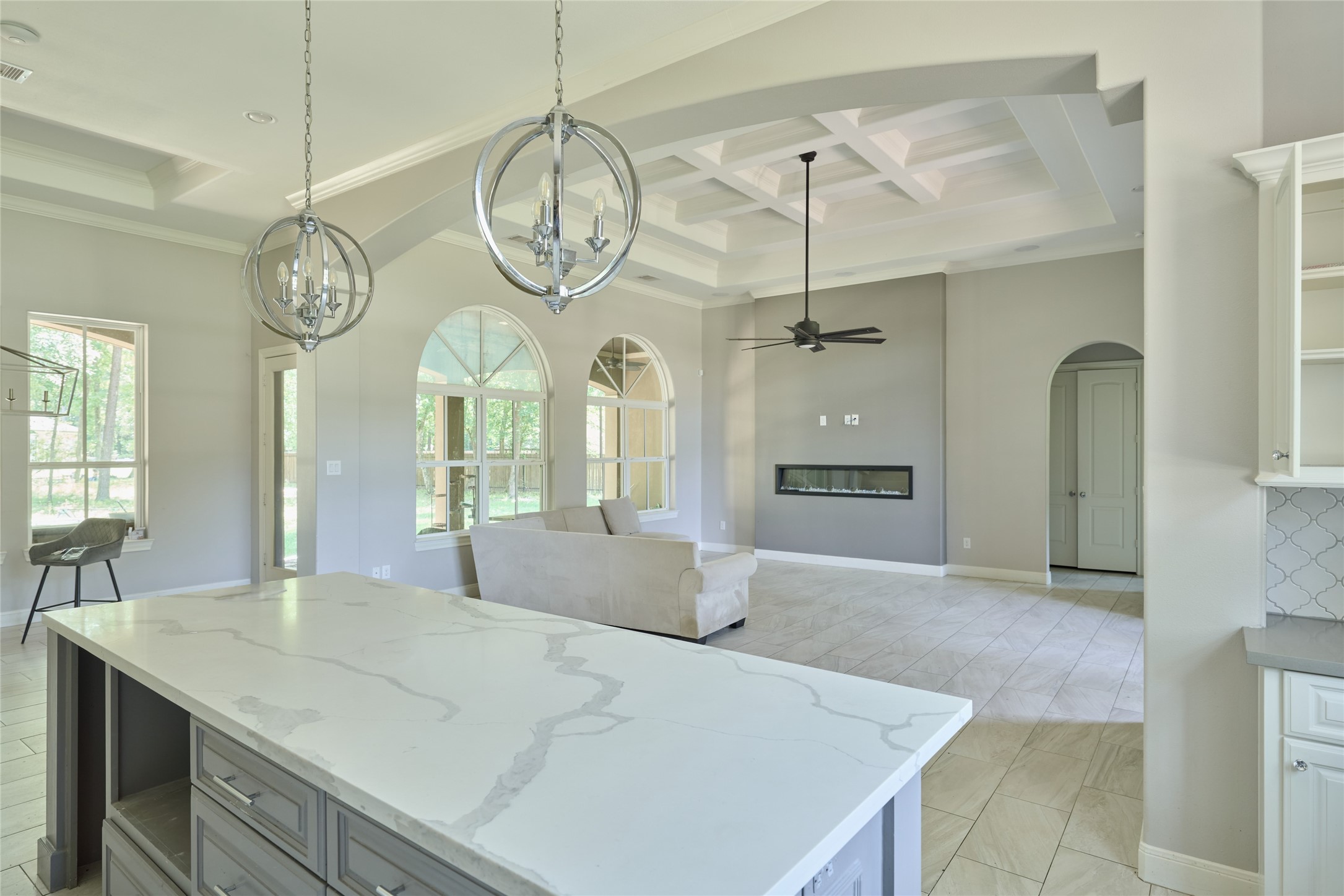 28526 Riverside Crest Lane Houston, TX 77336 - Photo 11 of 36 a large white kitchen with a large window and stainless steel appliances