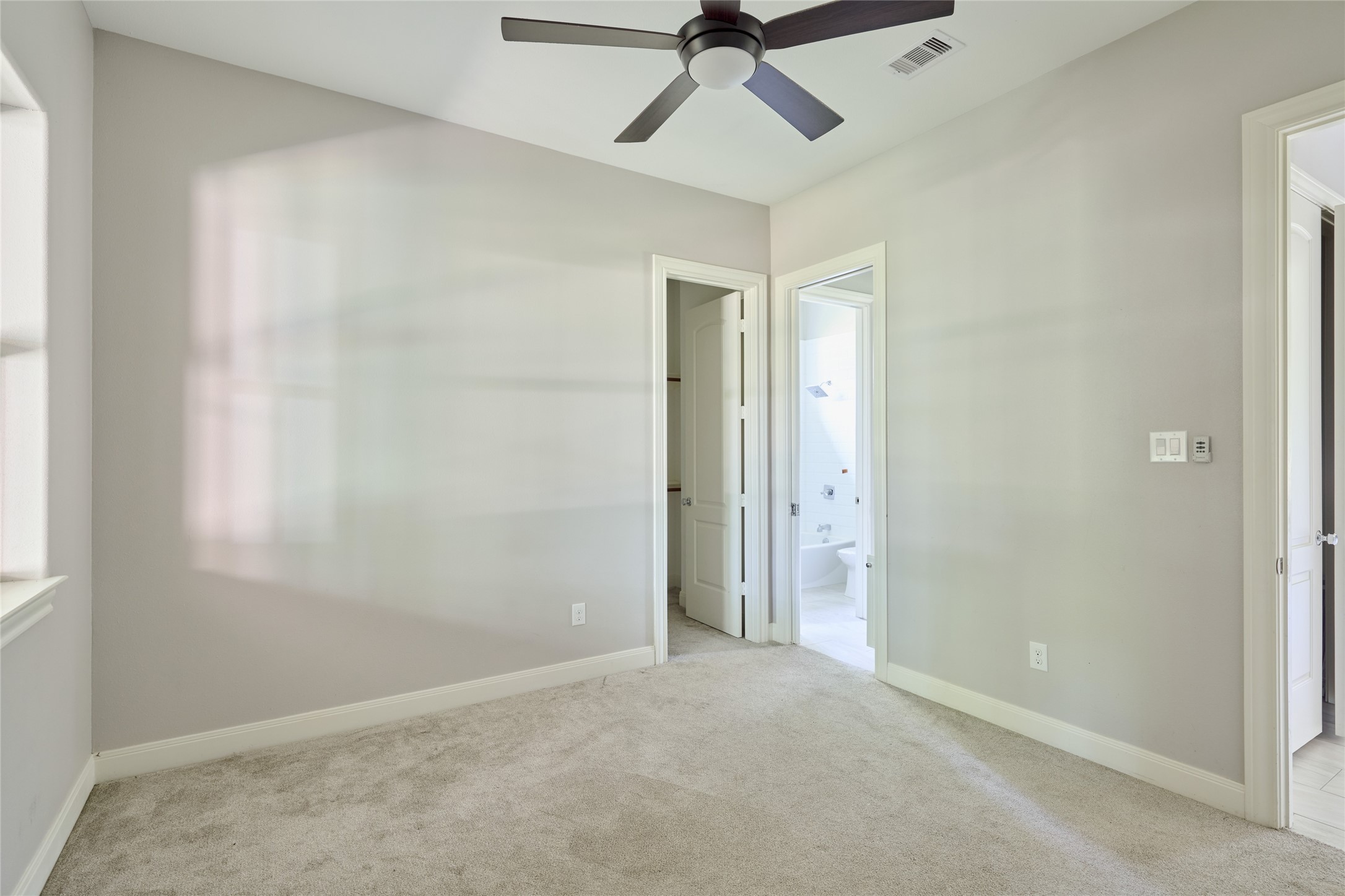 28526 Riverside Crest Lane Houston, TX 77336 - Photo 21 of 36 an empty room with a empty space and a ceiling fan