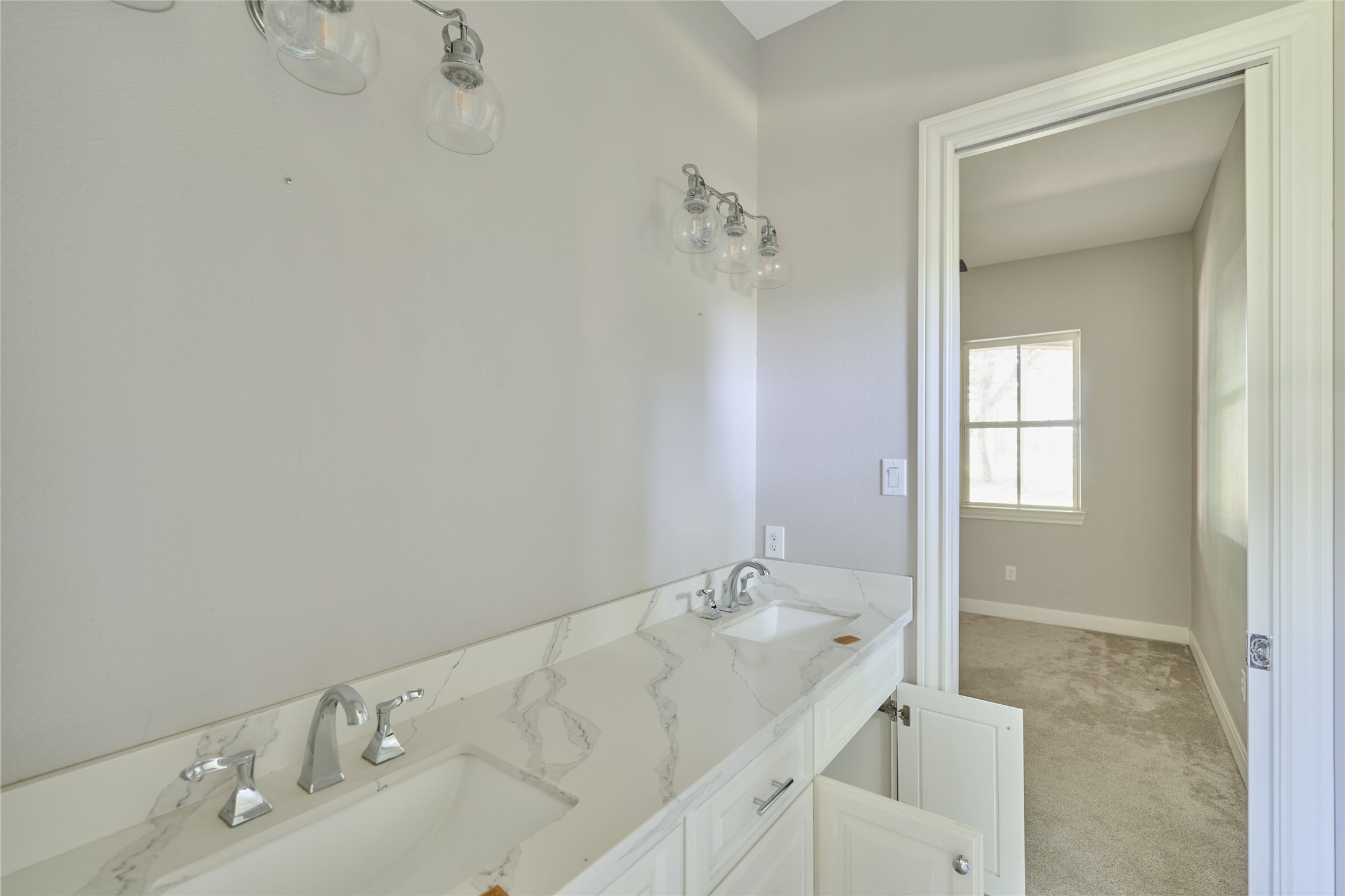 28526 Riverside Crest Lane Houston, TX 77336 - Photo 23 of 36 a bathroom with a sink and mirror