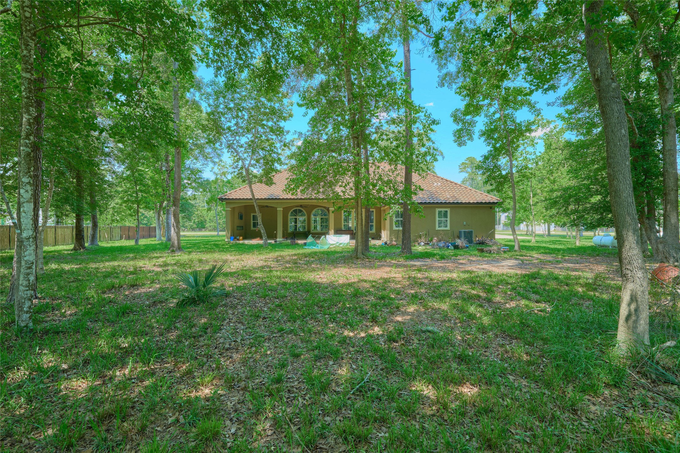 28526 Riverside Crest Lane Houston, TX 77336 - Photo 25 of 36 a front view of a house with a yard