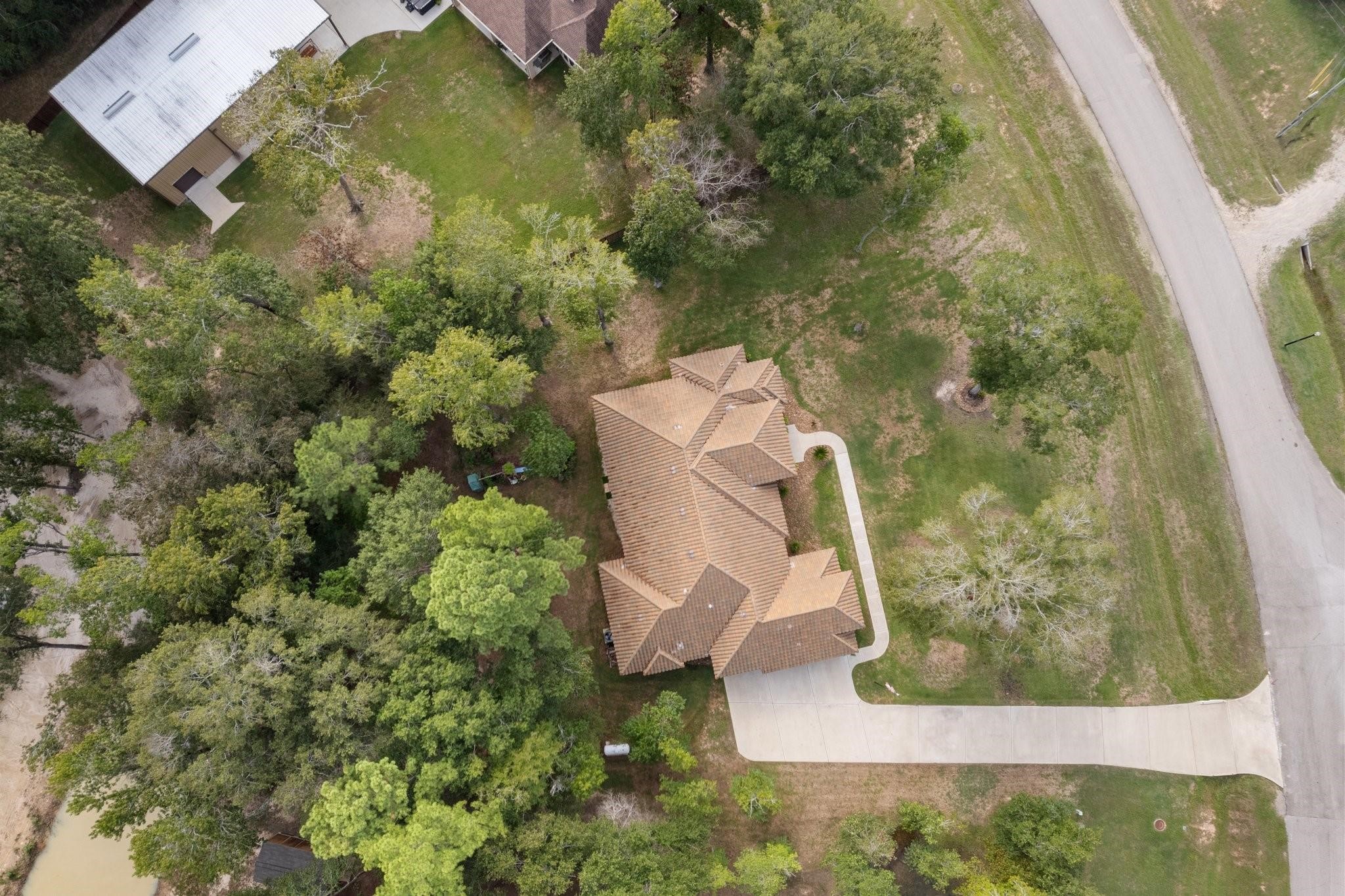 28526 Riverside Crest Lane Houston, TX 77336 - Photo 4 of 36 an aerial view of a house with a yard