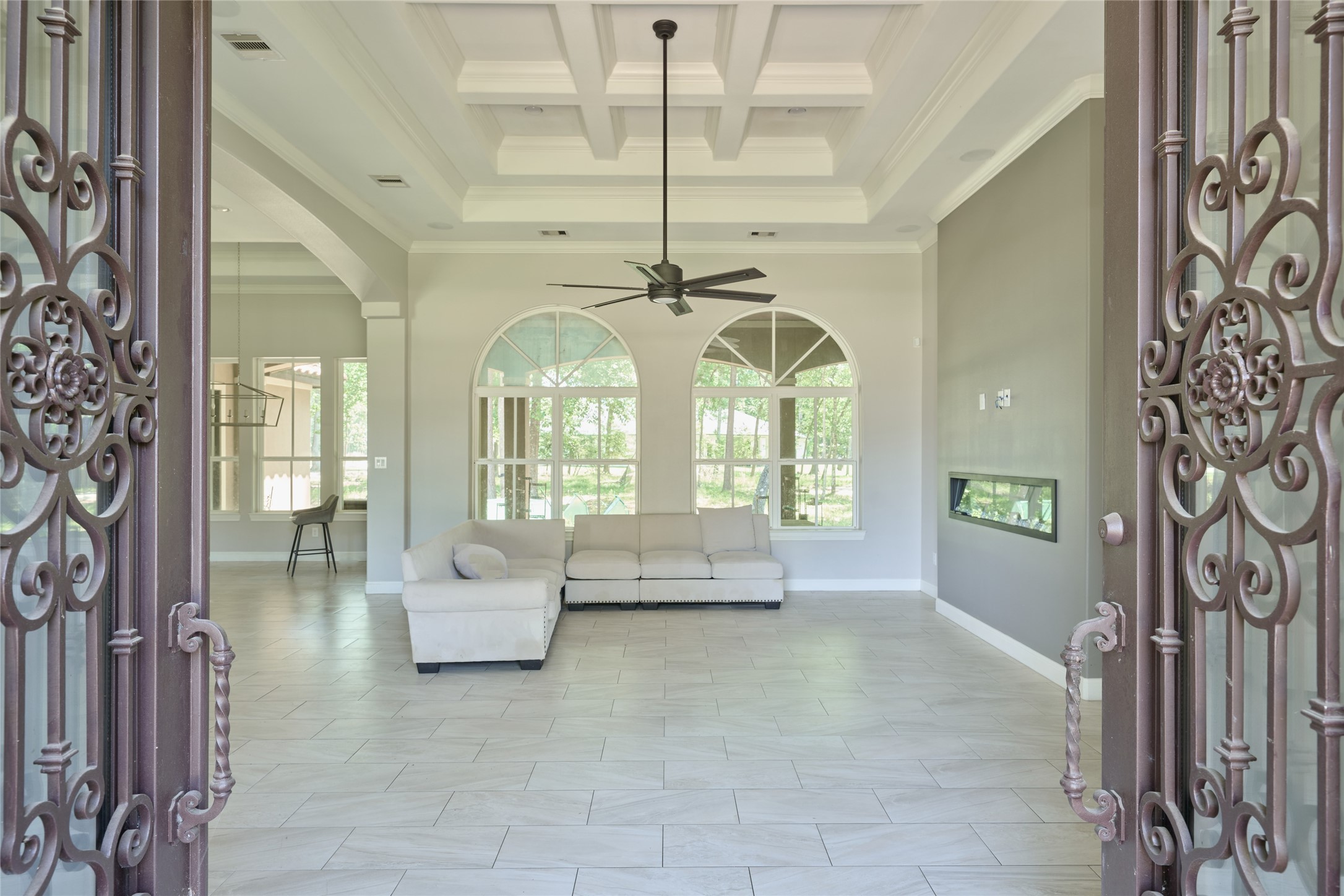 28526 Riverside Crest Lane Houston, TX 77336 - Photo 5 of 36 a living room with furniture and a chandelier