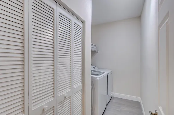 a utility room with dryer and washer