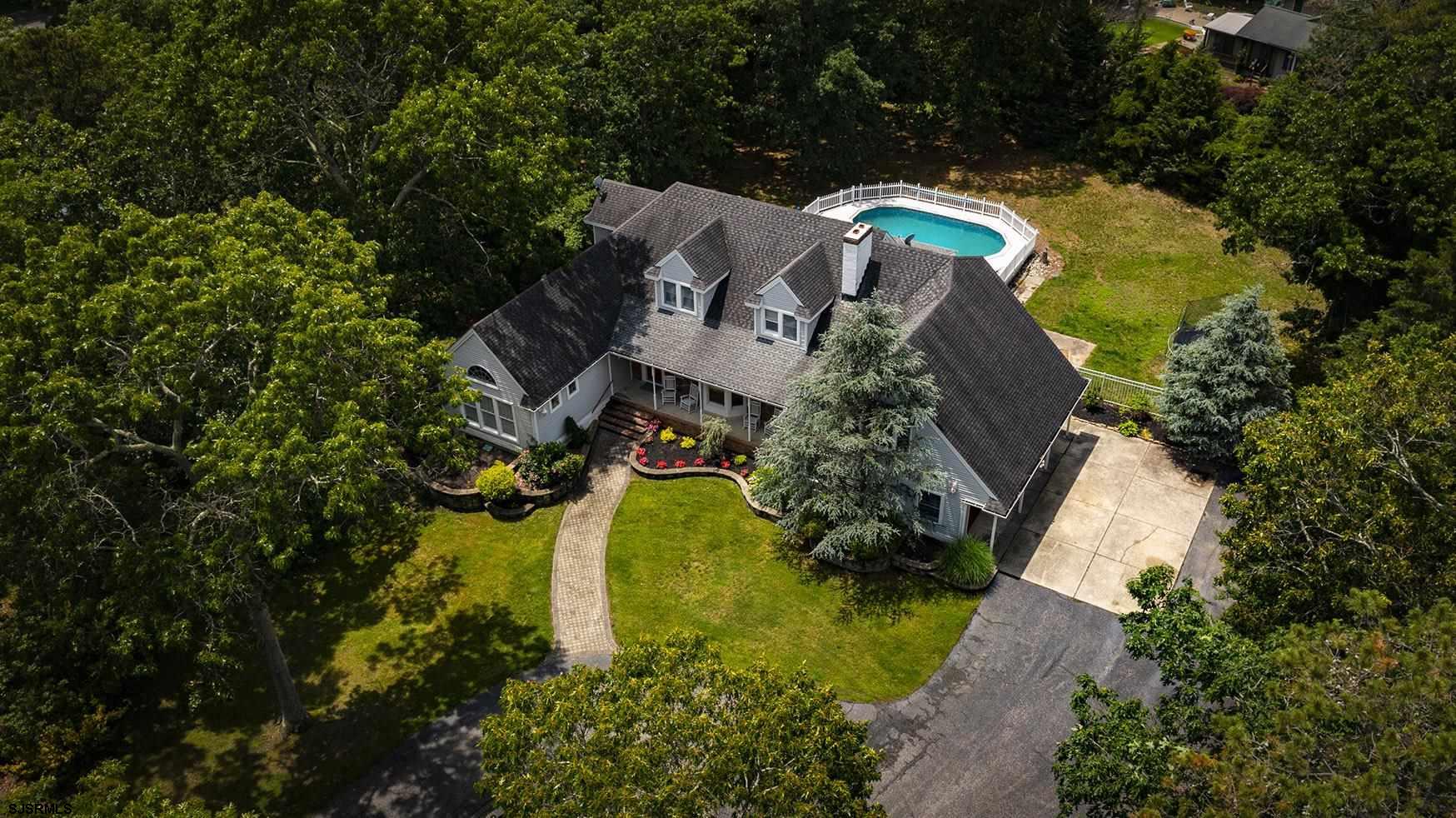 9 Edward Terrace Ocean View, NJ 08230 - Photo 2 of 30 an aerial view of residential house with outdoor space and swimming pool
