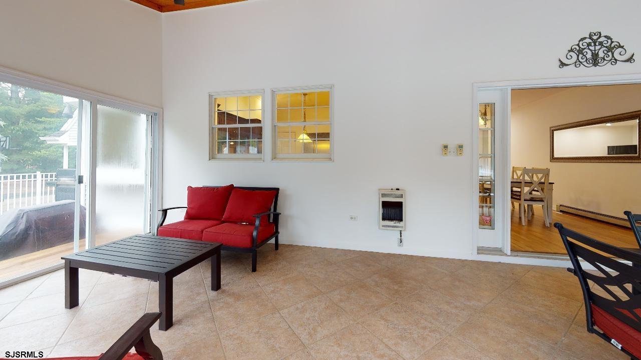 9 Edward Terrace Ocean View, NJ 08230 - Photo 12 of 30 a living room with furniture and a window